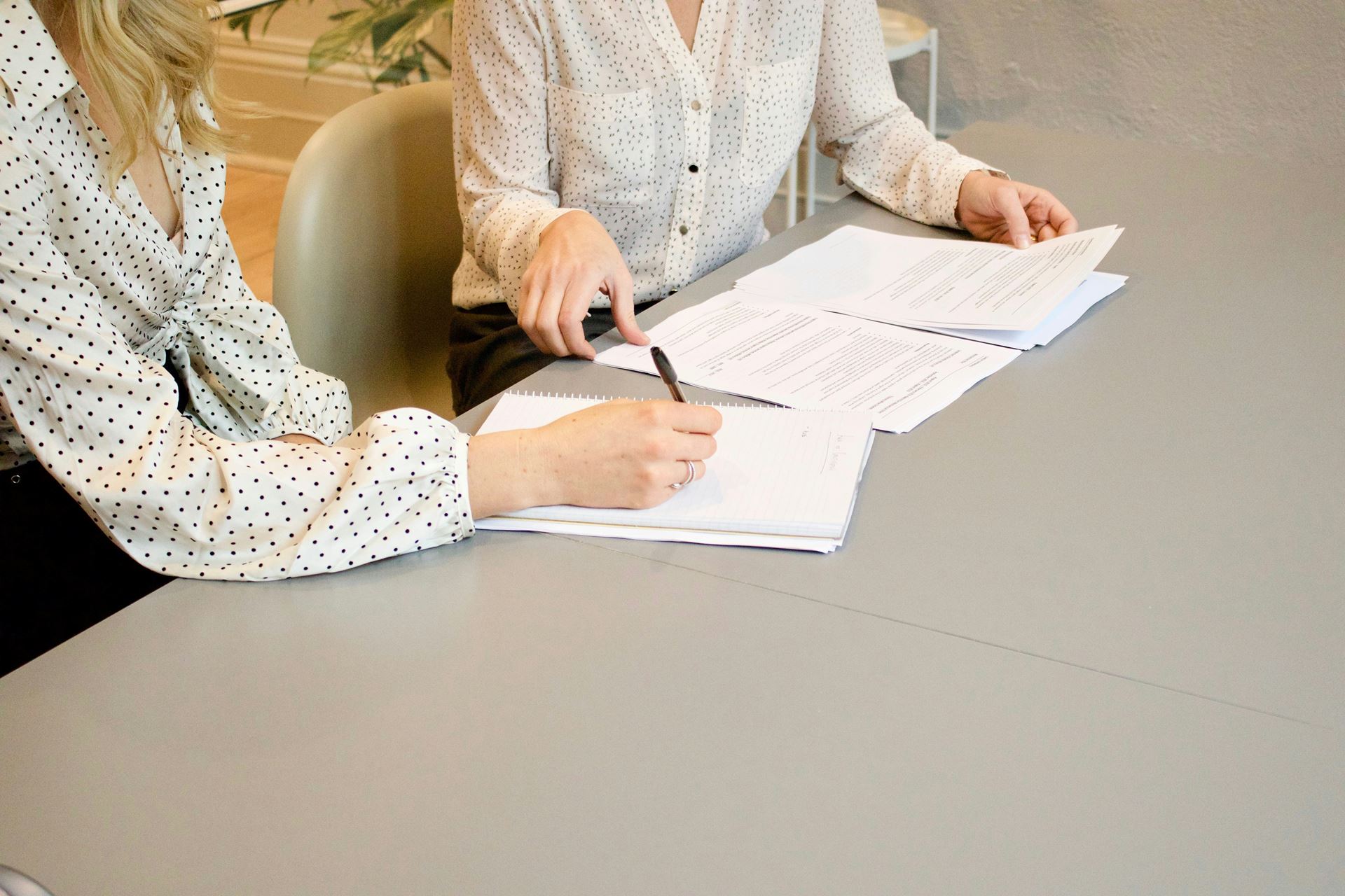 person signing paperwork